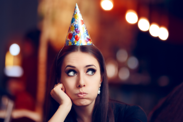 Unhappy woman at Birthday party
