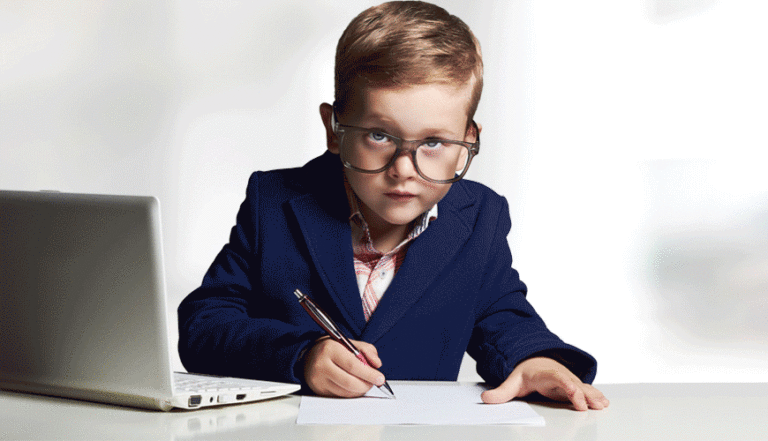Child dressed as a businessman, writing