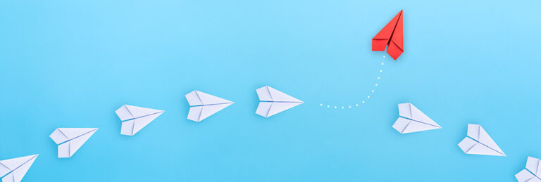 Illustration of a red paper airplane leaving a group of white paper airplanes.
