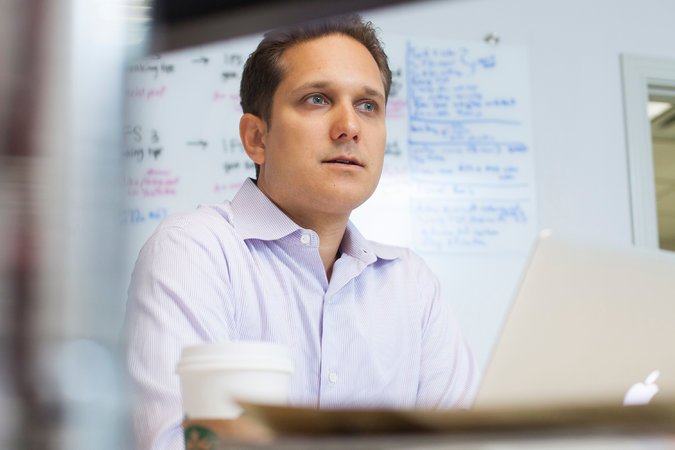 Jason Dorsey New York Times photo with laptop and white board