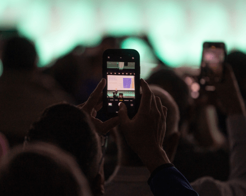 Audience-member-taking-picture-of-slide-actionable-insights
