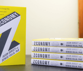Stack of books called Zconomy
